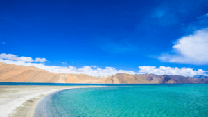 Ladakh Travel Diary – View of Pangong Lake with turquoise waters and mountain backdrop